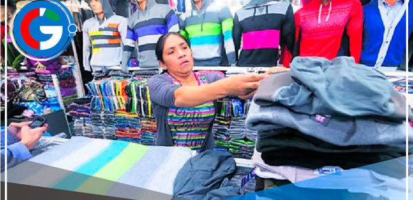Vendedores de ropa de invierno de gamarra, preocupados por intenso calor en Lima 