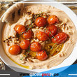 Prepara un delicioso hummus con tomatitos confitados
